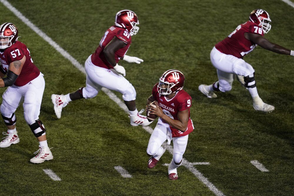 Indiana quarterback Michael Penix Jr. (9) runs in for a two-point conversion
